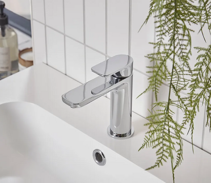 Tavistock Savour basin mixer tap with click waste, modern chrome finish, shown installed on a bathroom sink.