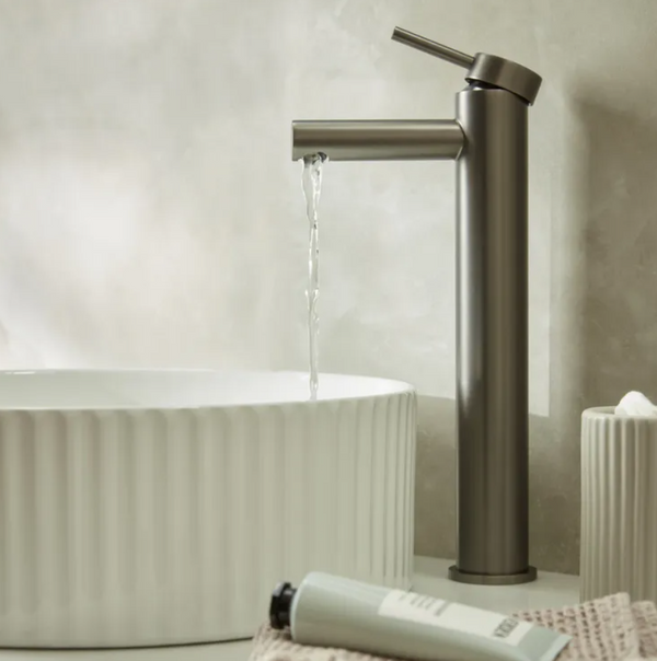 Tavistock Anthem tall basin mixer tap with click waste, featuring modern chrome finish and sleek design.