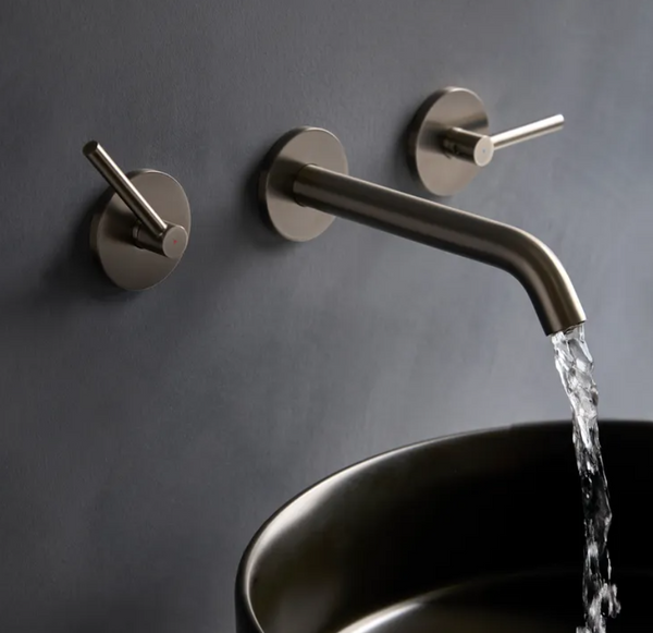 Tavistock Cohort lever wall-mounted basin mixer tap with modern design, chrome finish, and single lever control for bathroom sink.