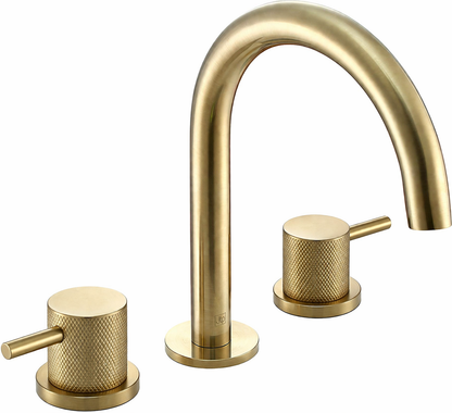 Gold faucet set on a white background